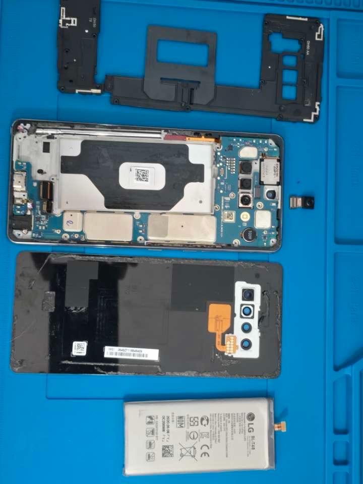 Smartphone disassembled with battery and camera module